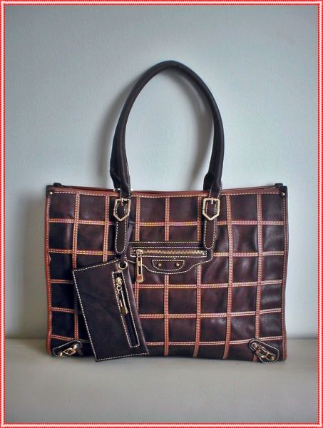 Bolsa em couro ecológico