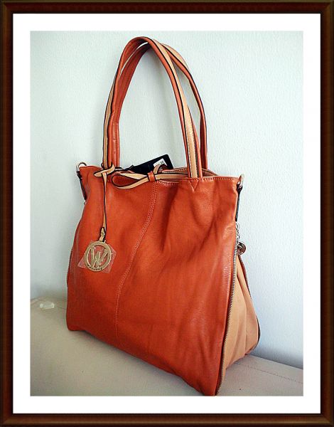 Bolsa em couro sintético